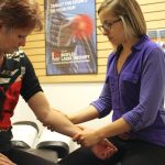 Doctor Mel treating with Active Release Techniques®
